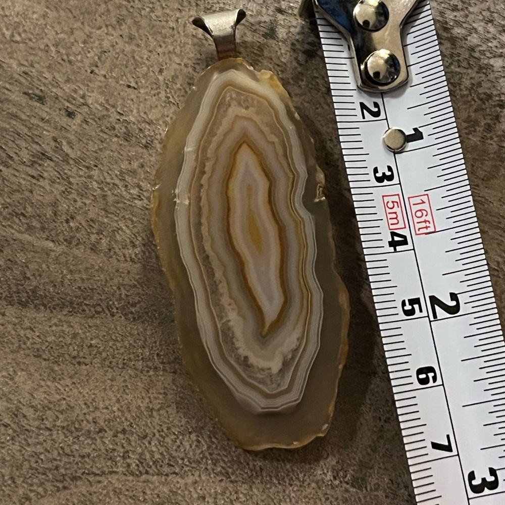 Raw agate slice pendant -approx 2.5 inches in length. Gorgeous!